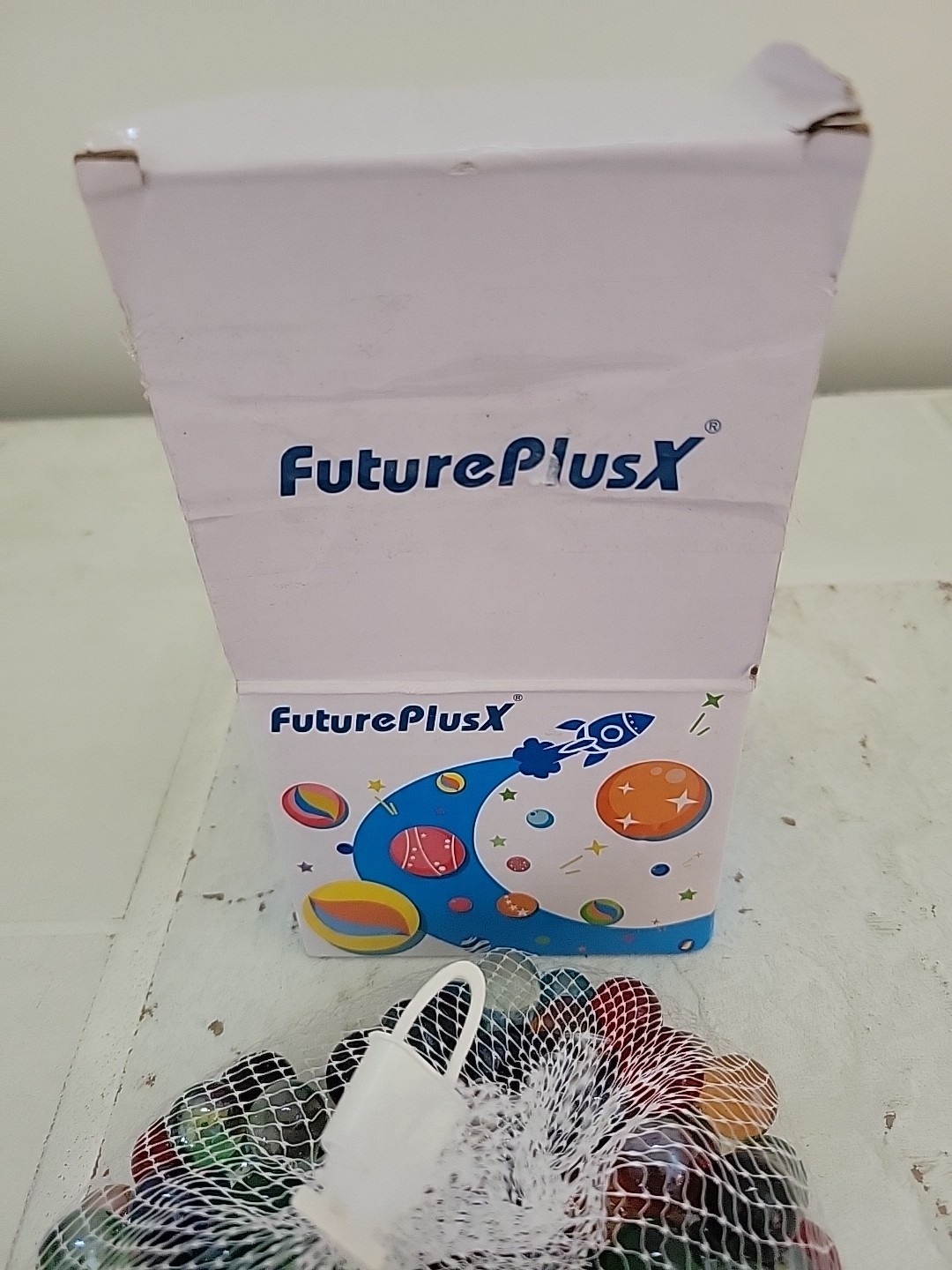 150 pc. Multi-colored glass marbles by Futureplusx.Still in bag and box