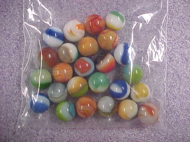 Group of 25 vintage marbles in bag mint condition