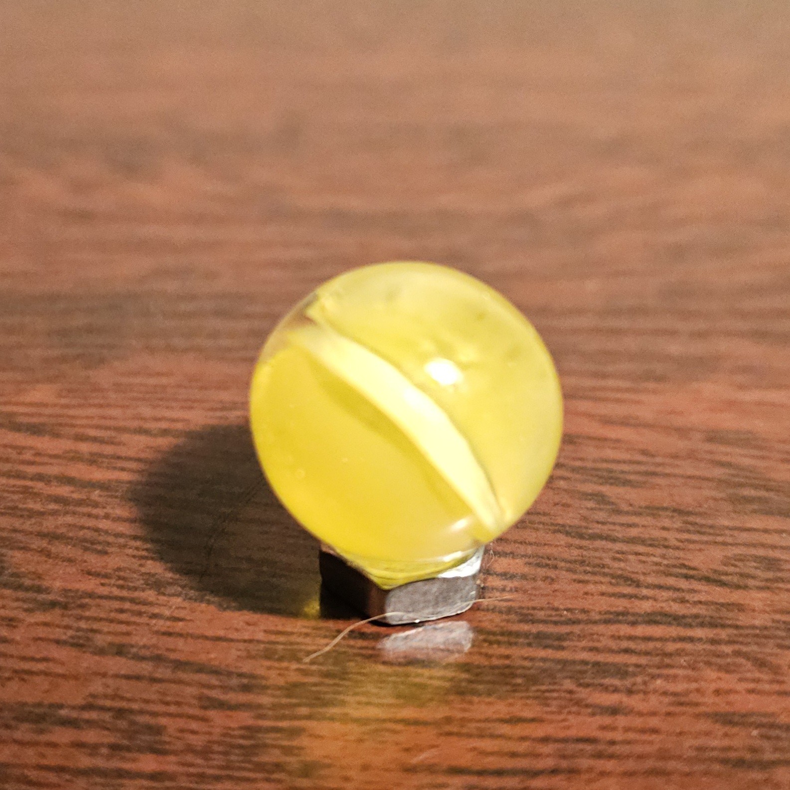 C E Bogard Yellow Cadmium Glow 4 Lobe Cats Eye Clear Glass .593 Marble