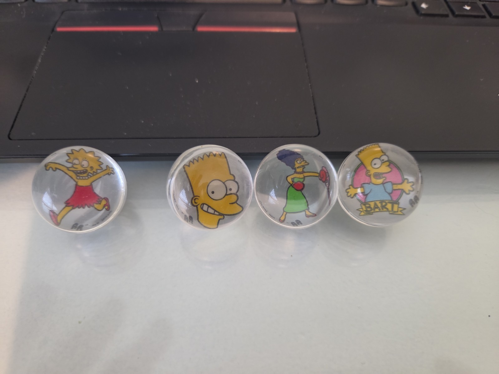 Lot of Four 1990 Spectra Star THE SIMPSONS Rad Rollors Marbles 2 Bart MARGE LISA