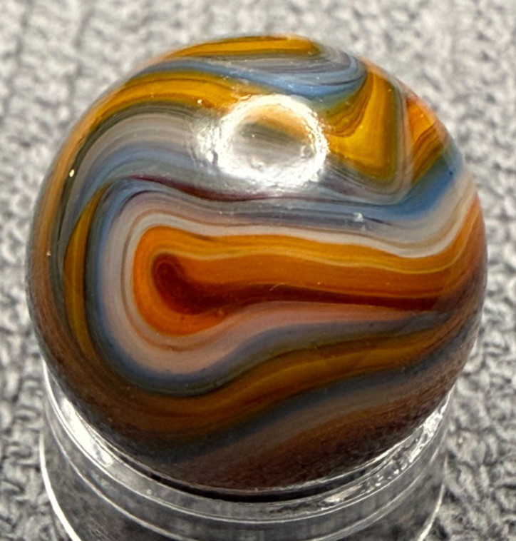 JABO / DAS .63″ Mint UV Glows Oxblood Orange Blue Yellow Swirl Marble (274)