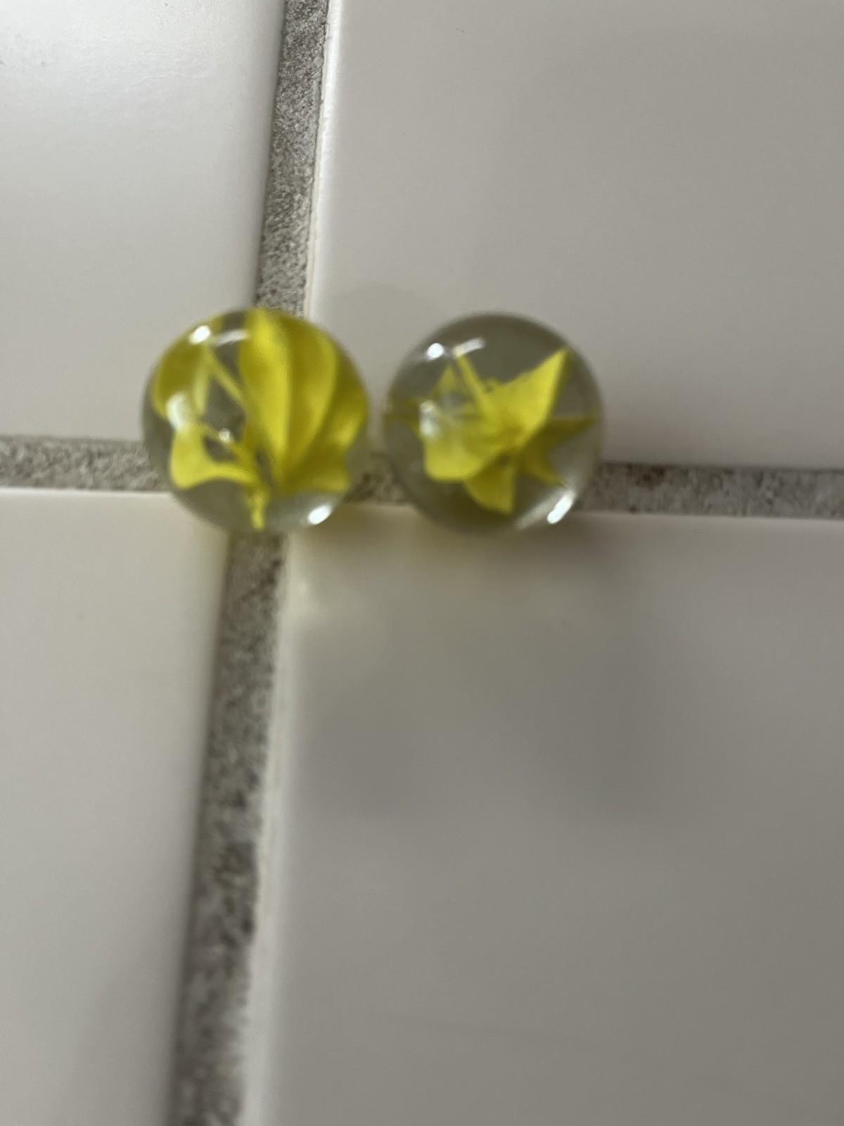 Two Vintage Vitro Agate Caged Cats Eye Shooter Marbles