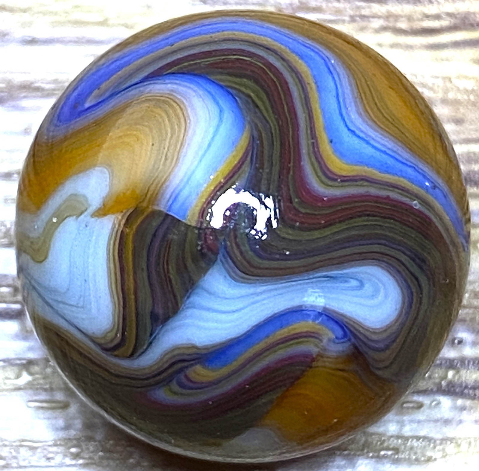 BEAUTIFUL OXBLOOD RIBBONED SWIRLED SHOOTER .74″ M273