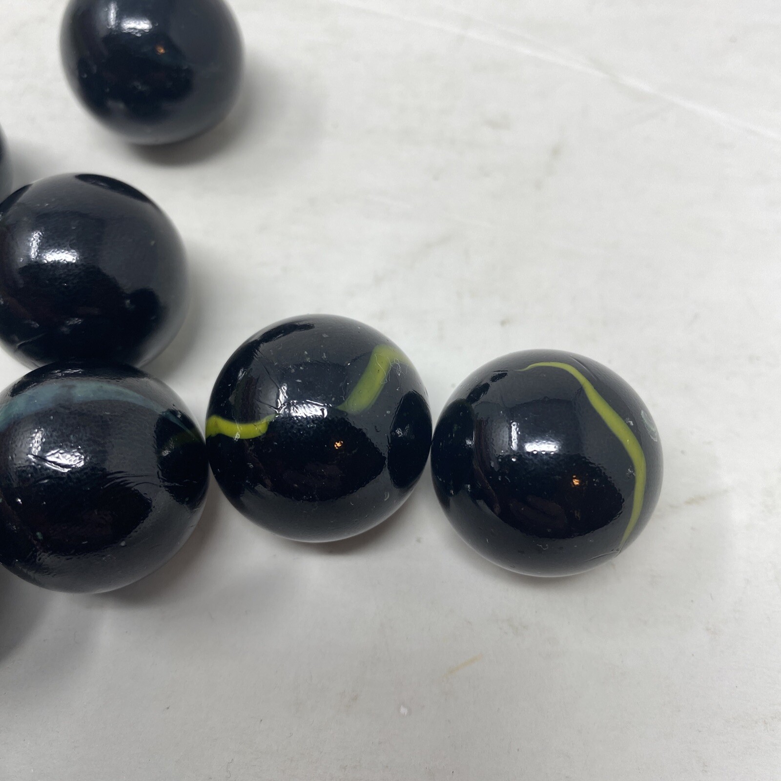 Lot Of 11 Vintage Marbles Black With Green/Yellow Color Swirl