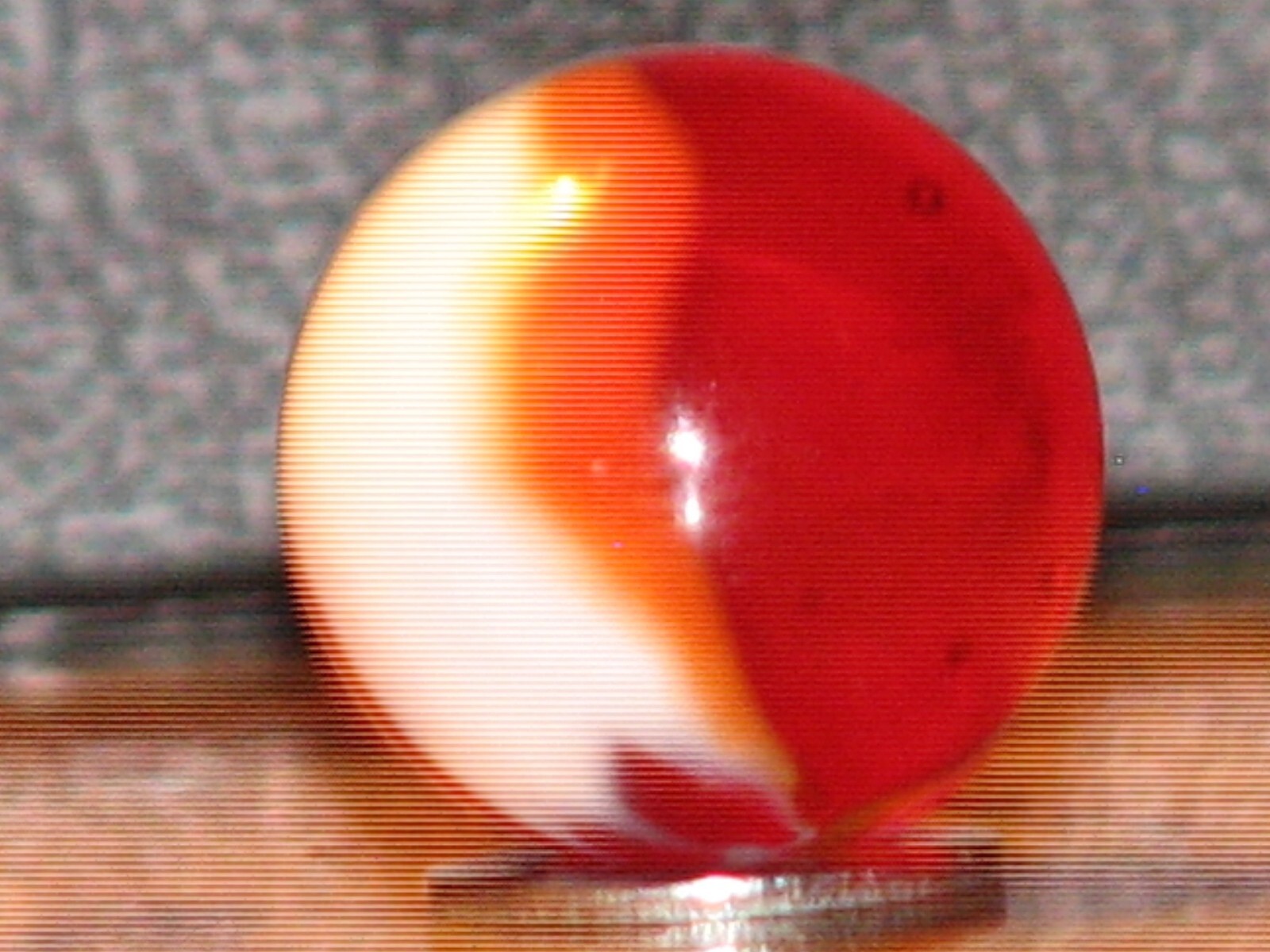 .615 in. Pelter? marble, mint