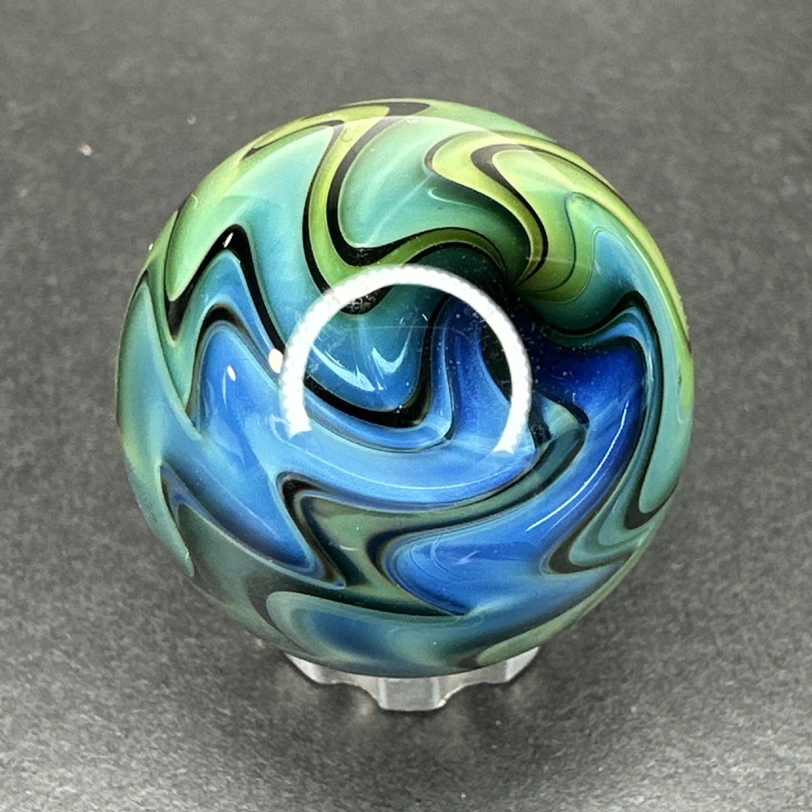 Contemporary Art Glass Marble 1″ Fumed Blue Green Wigwag W/ UV Reactive Glow!
