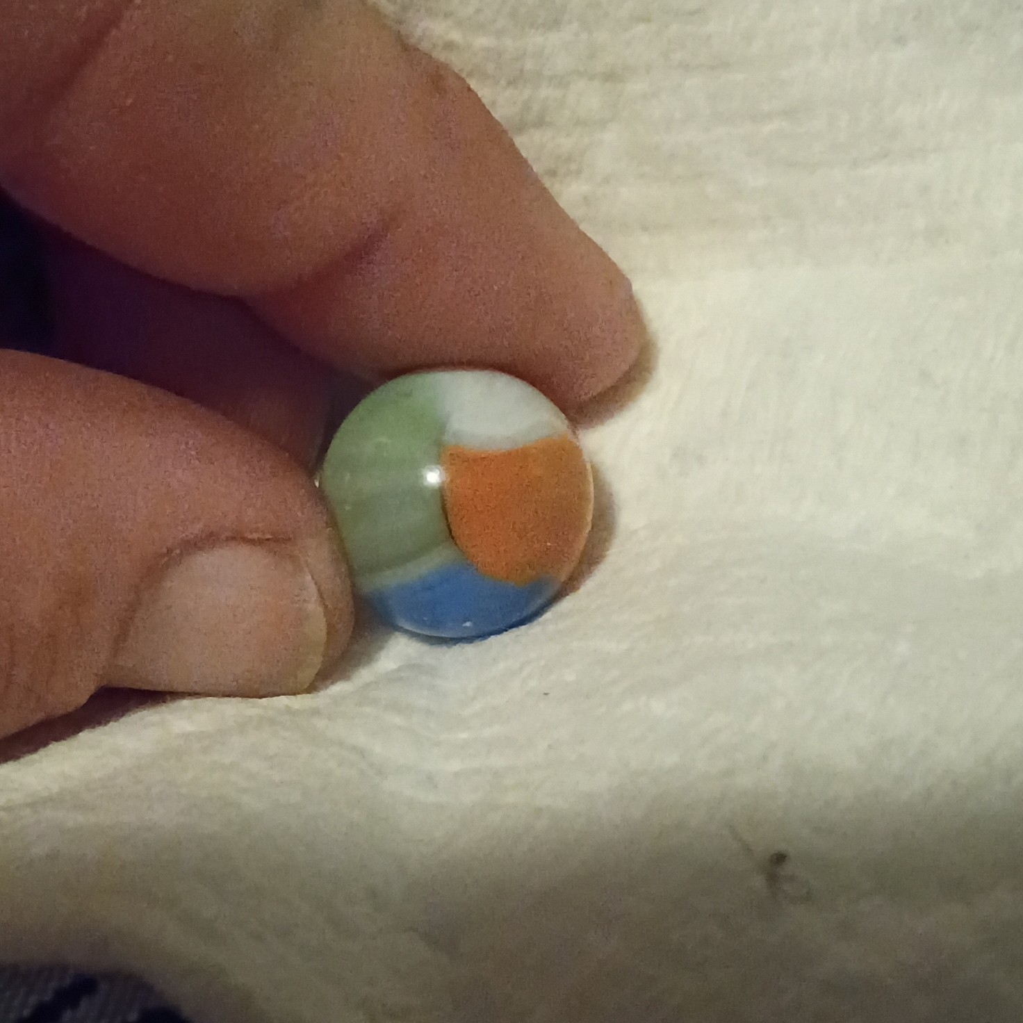 beach ball marble colorful orange blue green white and yellow