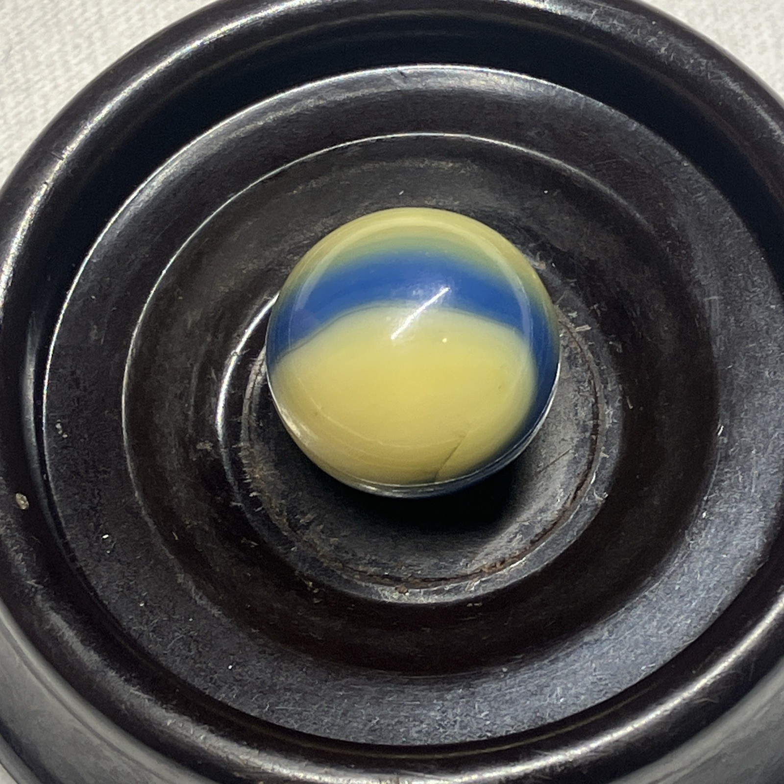 Vintage Akro Agate Corkscrew swirl banana yellow ocean blue glass marble wet