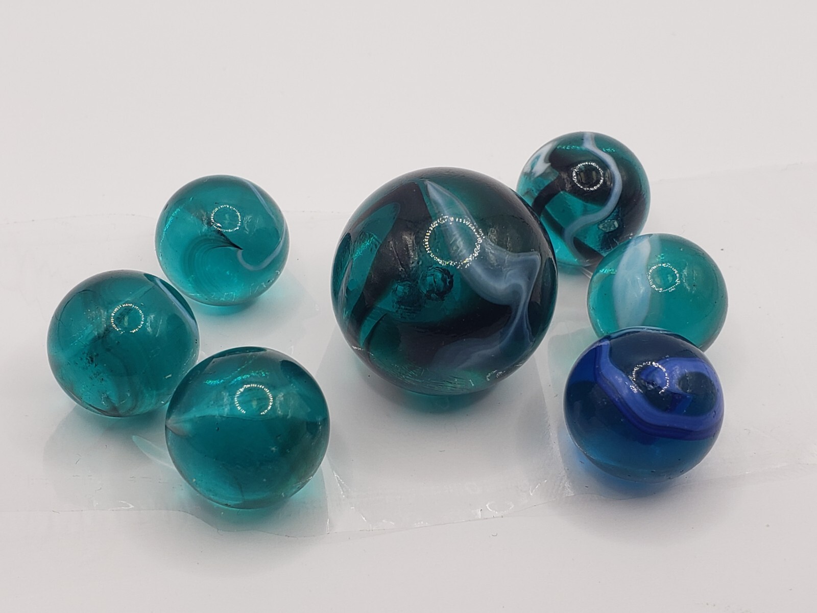 Vintage Unique Swirl Shooter Set Marbles Lot of 7 Translucent Blue White & Black