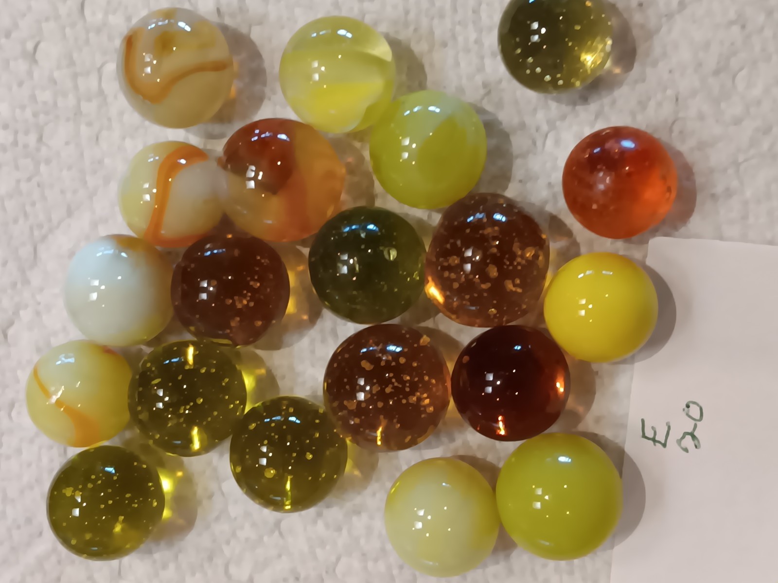 Vintage Cadmium Machine Made Glass Marbles Glow Orange With UV Light. Lot Of 21