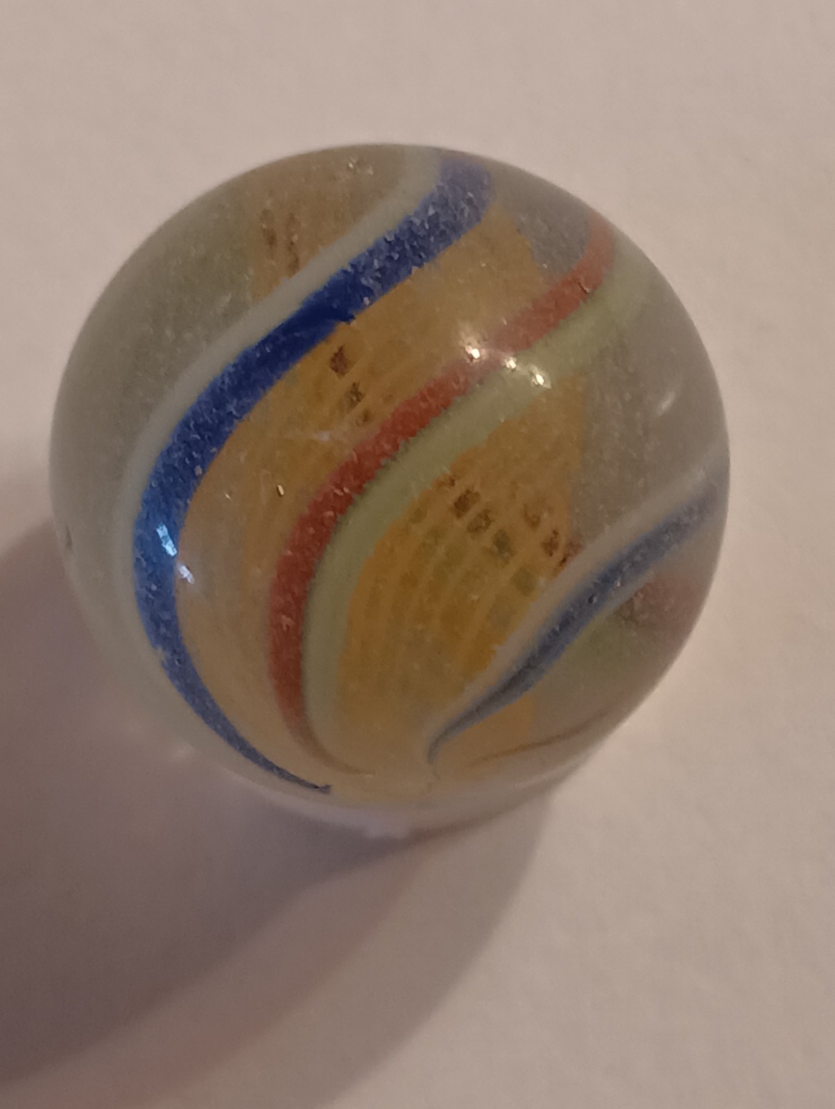 German Latticinio Yellow Core Marble. .74 Inch Blue White / Red Green Stripes