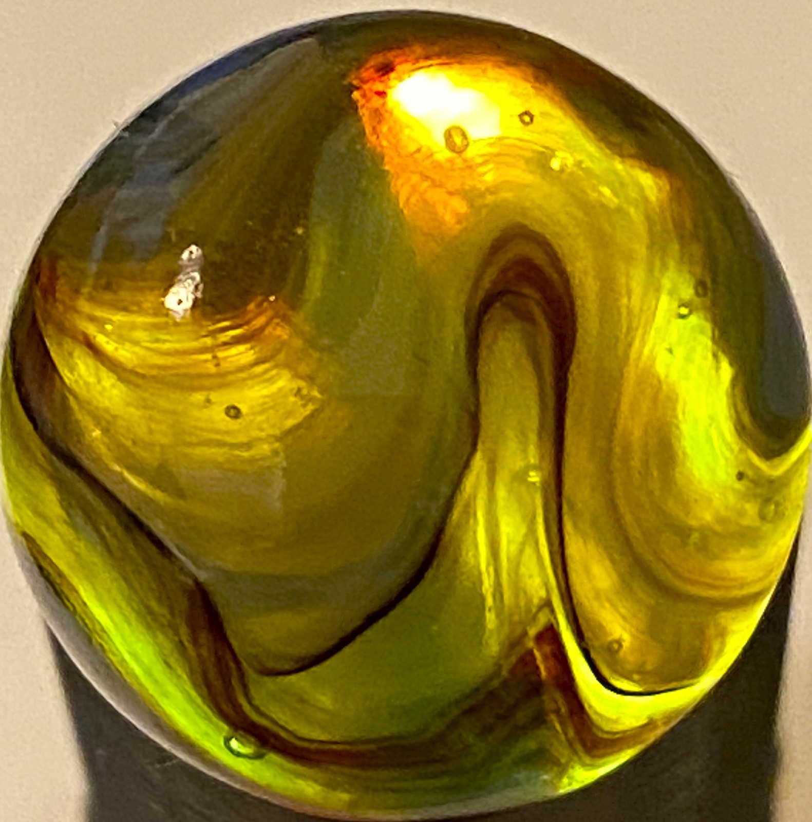 DAS/JABO WAVY BLUE AND TRANSPARENT OXBLOOD SWIRLED SHOOTER .69″ BOX03/350