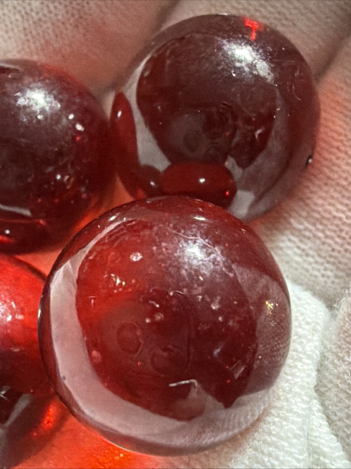 Vintage Lot of 4 Clear Ruby Red Cadmium Slag Glass Marbles UV Reactive As Is