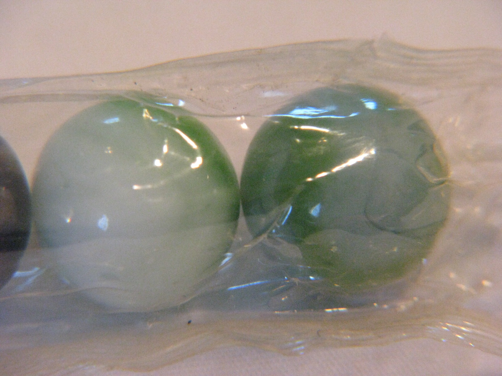 VINTAGE PACK OF SIX GLASS MARBLES IN PKG