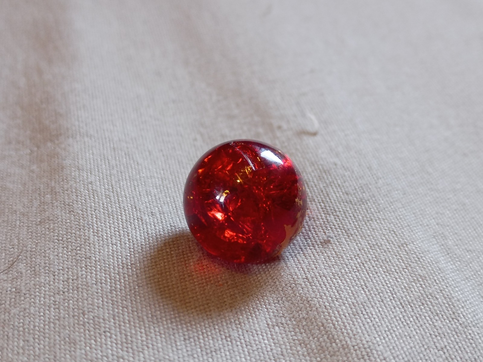 4 Vintage 1/2″ Red Crackle Glass with Cadmium Playing Marbles.