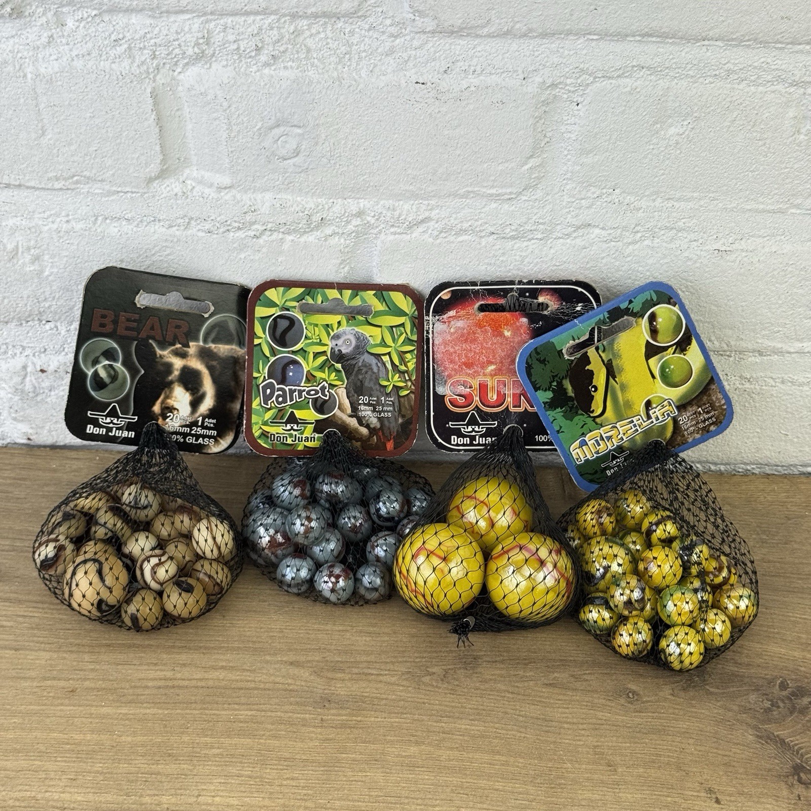 4 Net bags Vacor de Mexico – Bear – Parrot – Morelia – Sun Boulder marbles