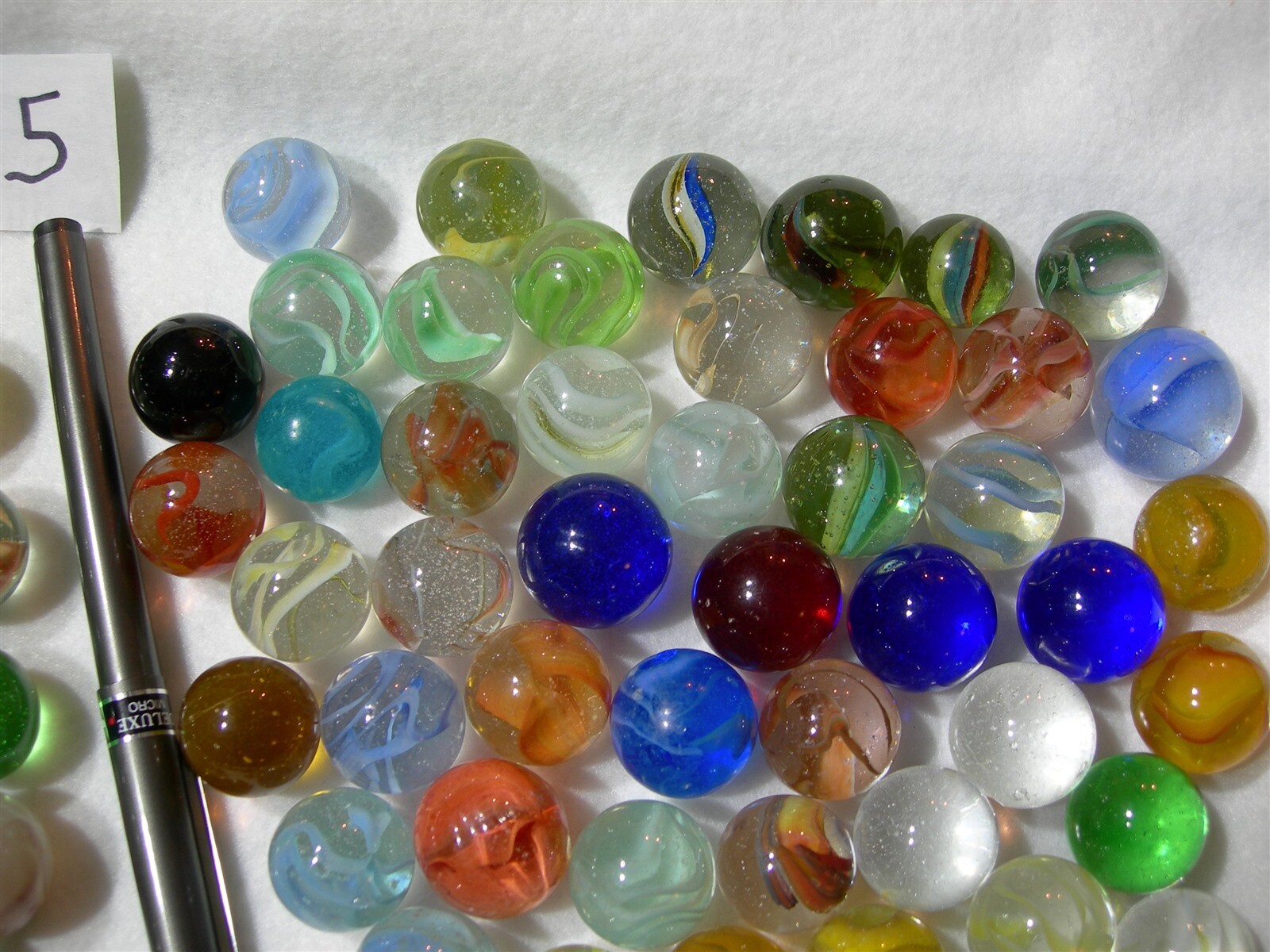 Lot #5 – 150 shooters swirl, misc. marbles