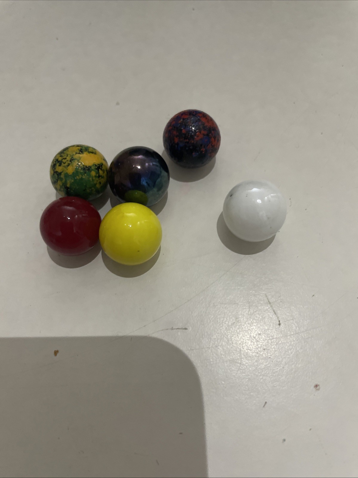 8 Small Marbles And 6 Tiny Marbles