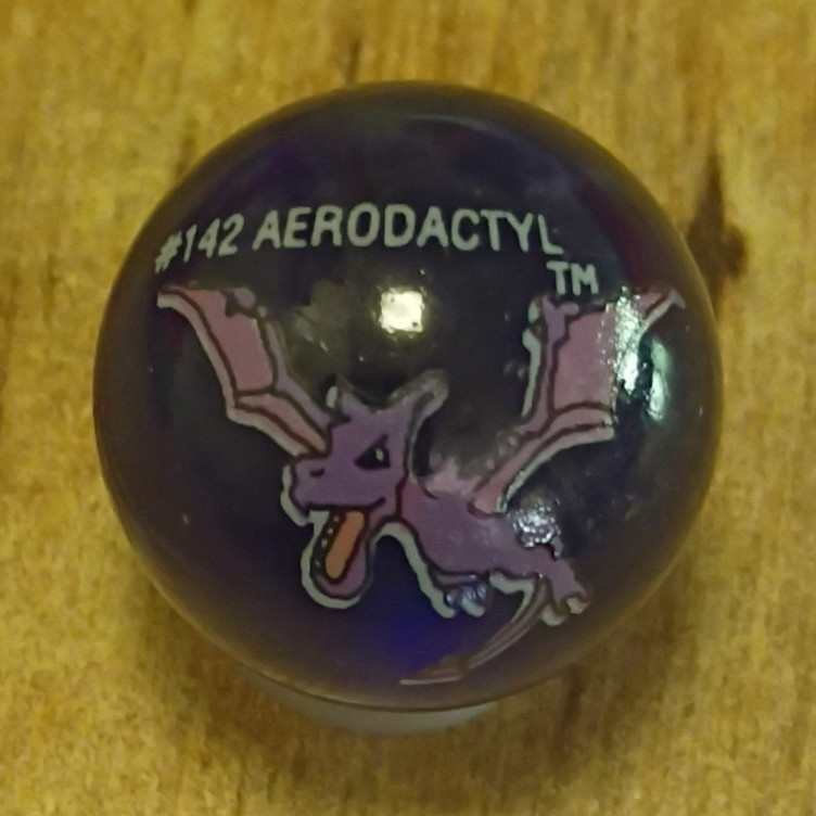 Machine Made Glass Marble w/ #142 AERODACTYL Pokémon Design Purple