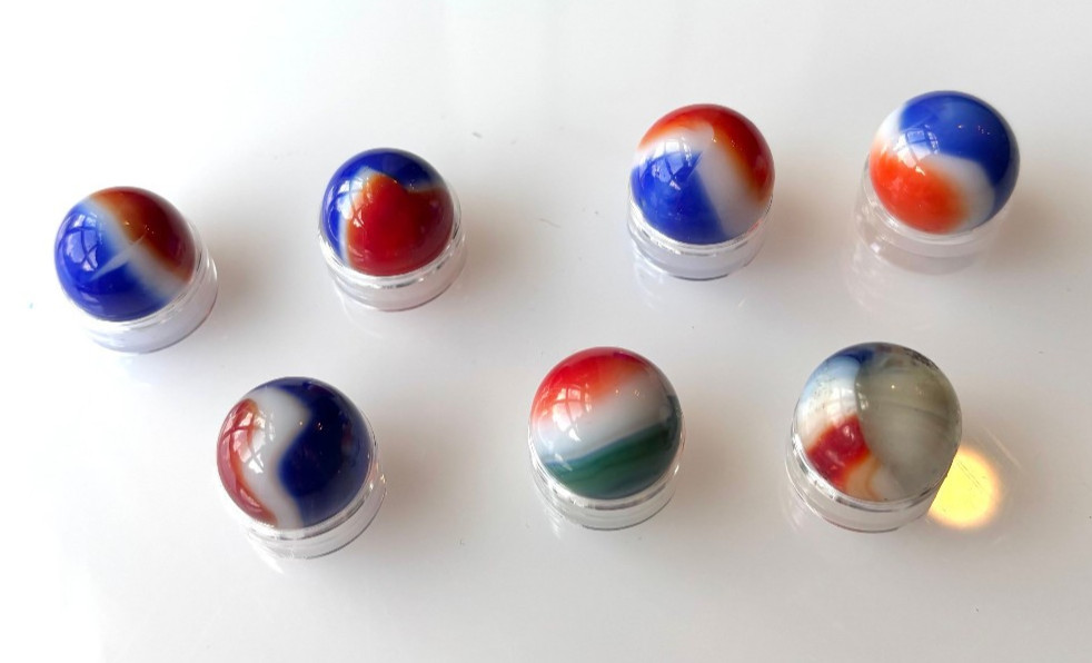 7 VTG Glass Marbles-6 Red White Blue, 1 Red White Green, Approx .57″-.62″ Lot 12