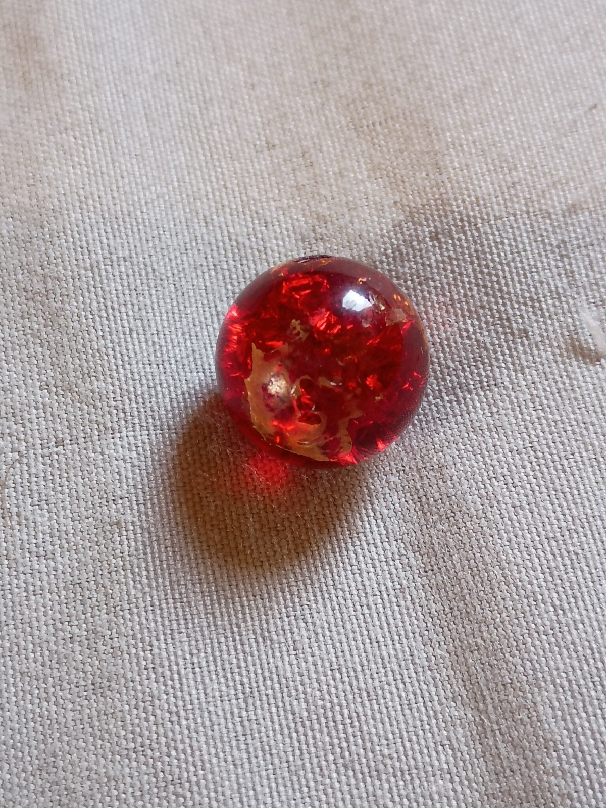 4 Vintage 1/2″ Red Crackle Glass with Cadmium Playing Marbles.
