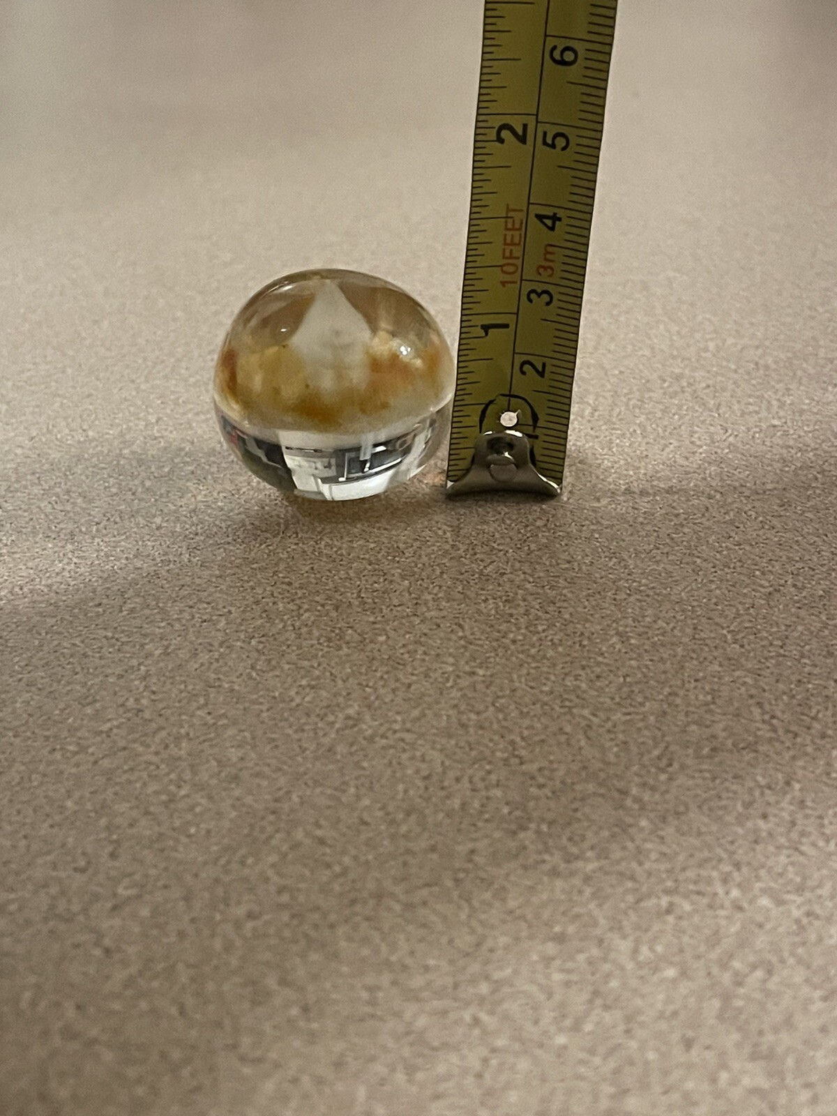 1 1/2 “ Tall Glass Marble , Two Tiny Chips On The Bottom Read Desc
