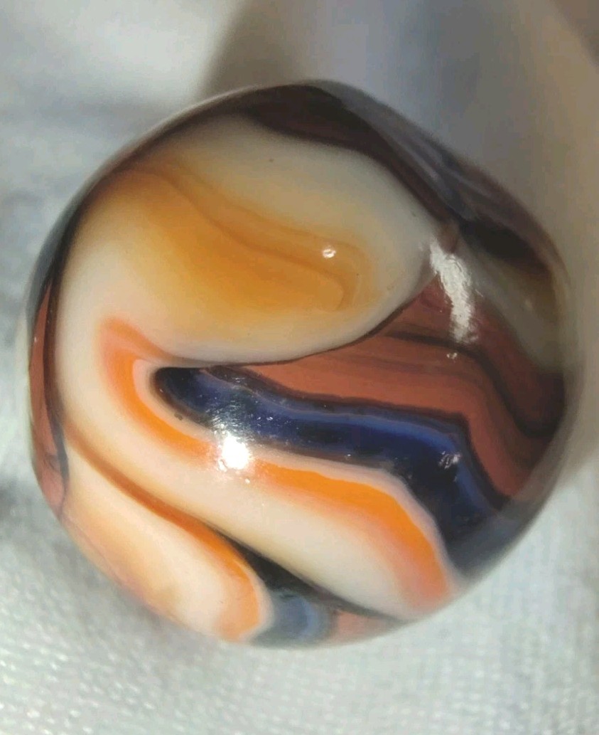 Jabo/DAS Cranberry Busy Gorgeous Flame Swirl Shooter Marble .74 Out Of Round