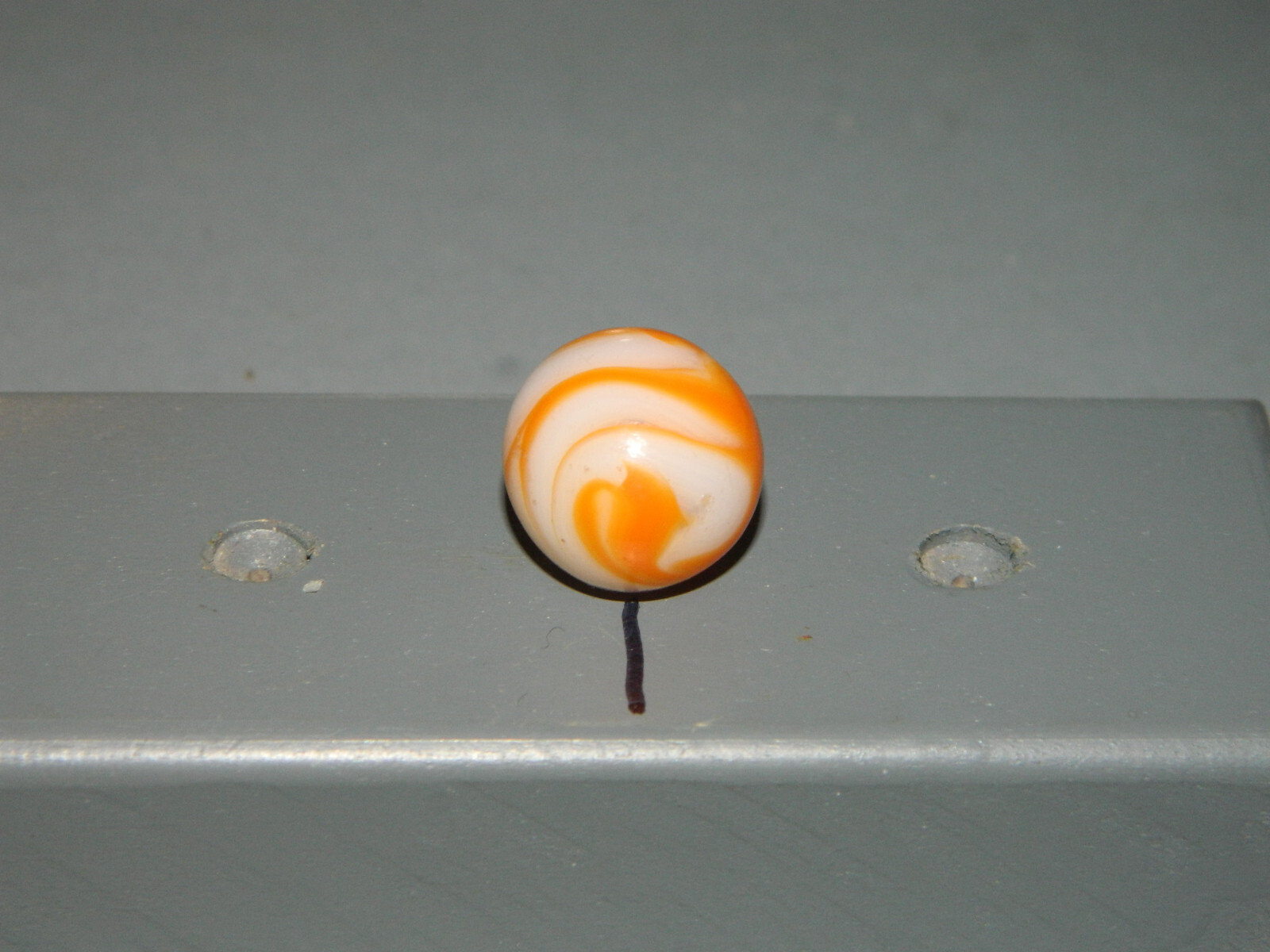 Vintage West Virginia Swirl White Base Orange Swirl approx 5/8+”