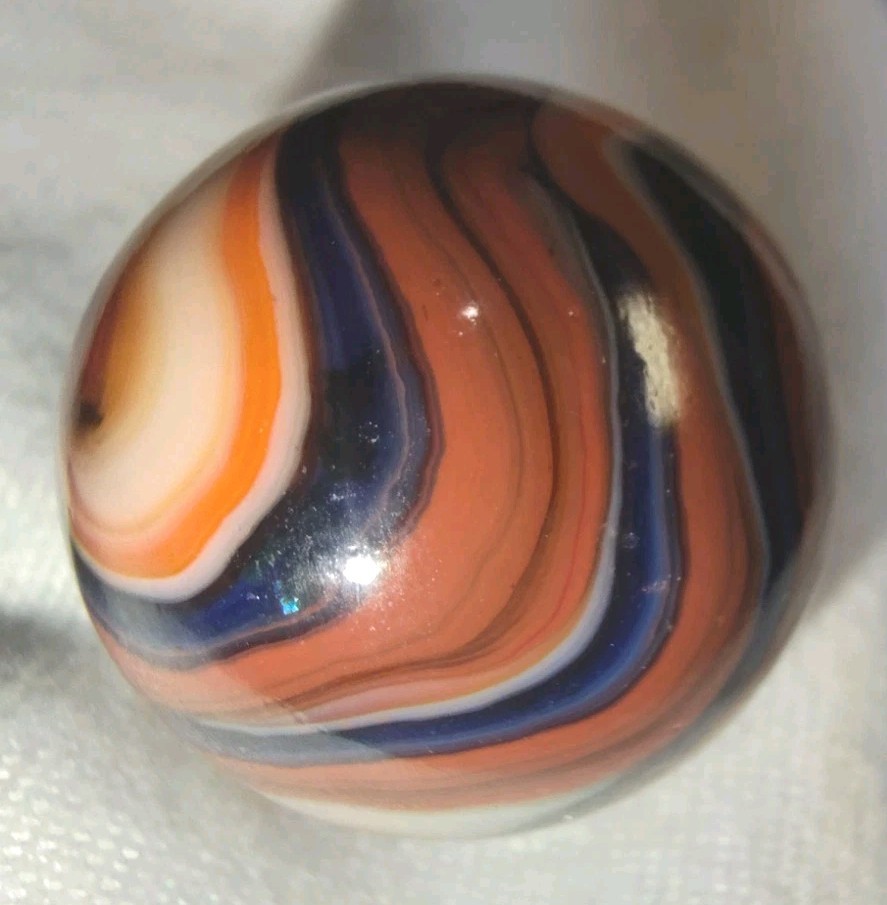 Jabo/DAS Cranberry Busy Gorgeous Flame Swirl Shooter Marble .74 Out Of Round