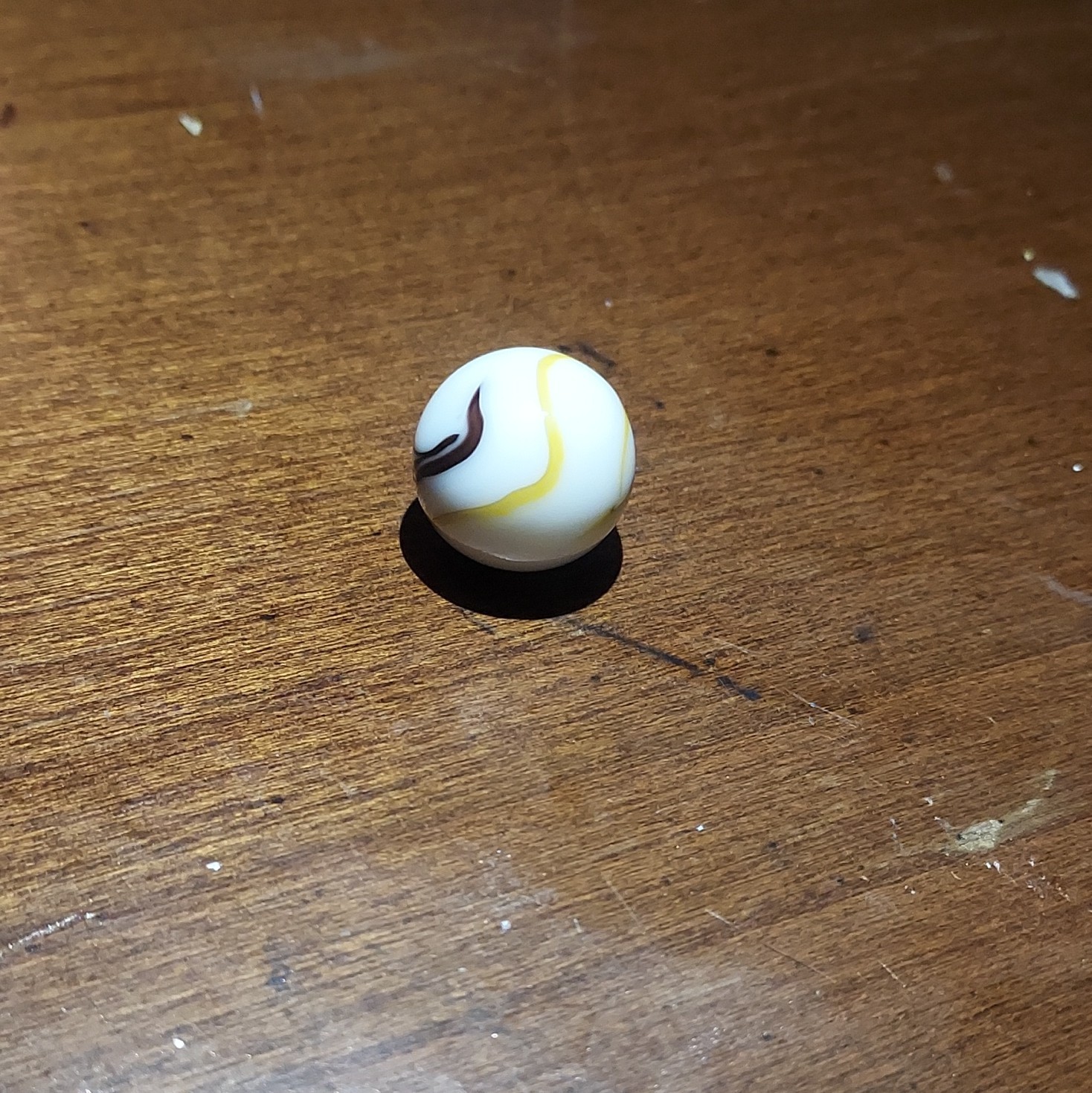 White Glass Toy Marble – White Swirl w/ Black & Yellow Ribbon, Single, Ages 17+