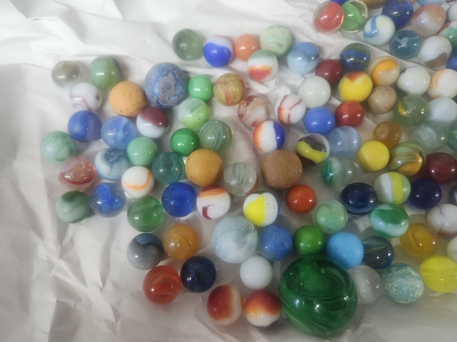 Lot of 130 vintage marbles in vintage Cherrydale Farms peanut Crunch 1950s Can.