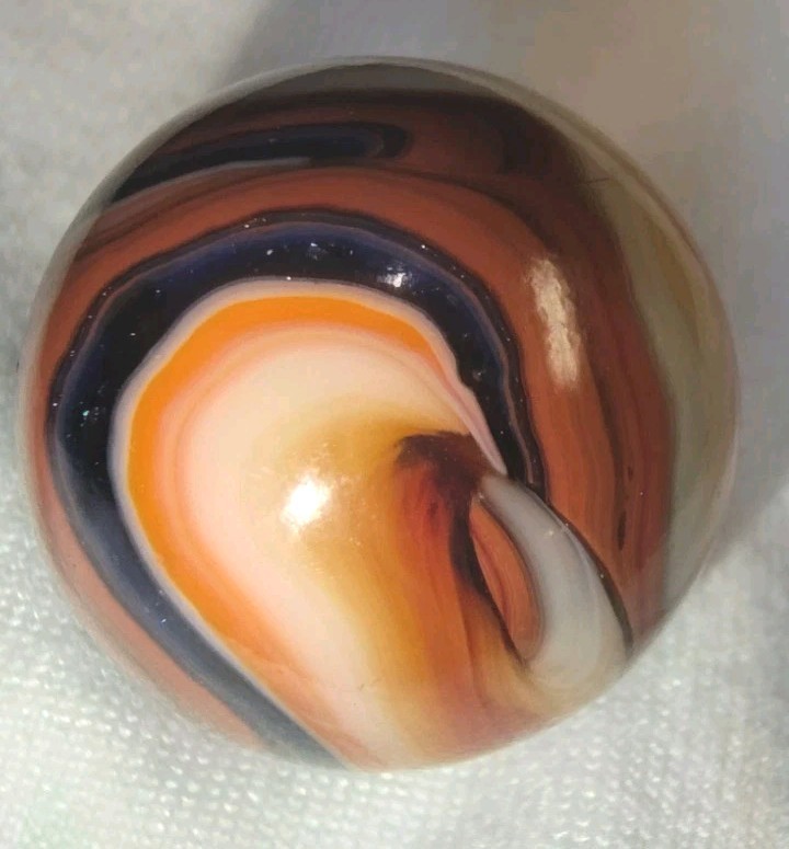 Jabo/DAS Cranberry Busy Gorgeous Flame Swirl Shooter Marble .74 Out Of Round