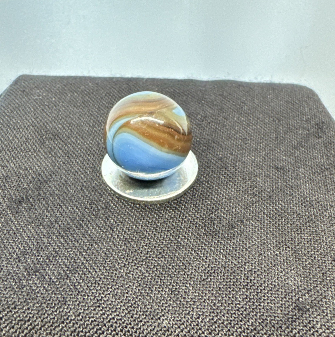 Christiansen Agate Opaque Blue Base With Brown Swirls..63″ Wet Htf Brown