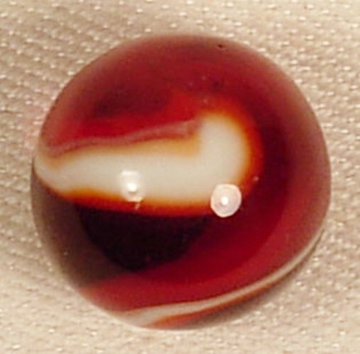 AKRO AGATE ONYX CORKSCREW MARBLE RED TRANSPARENT BASE WHITE SPIRAL 11/16″