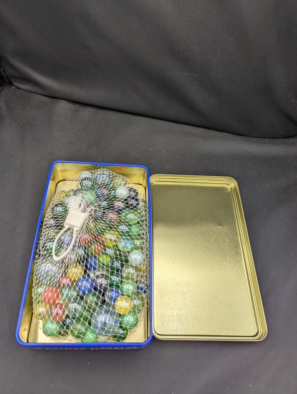 Pavillion Deluxe Marbles 160 includes Shooters Collector’s Tin