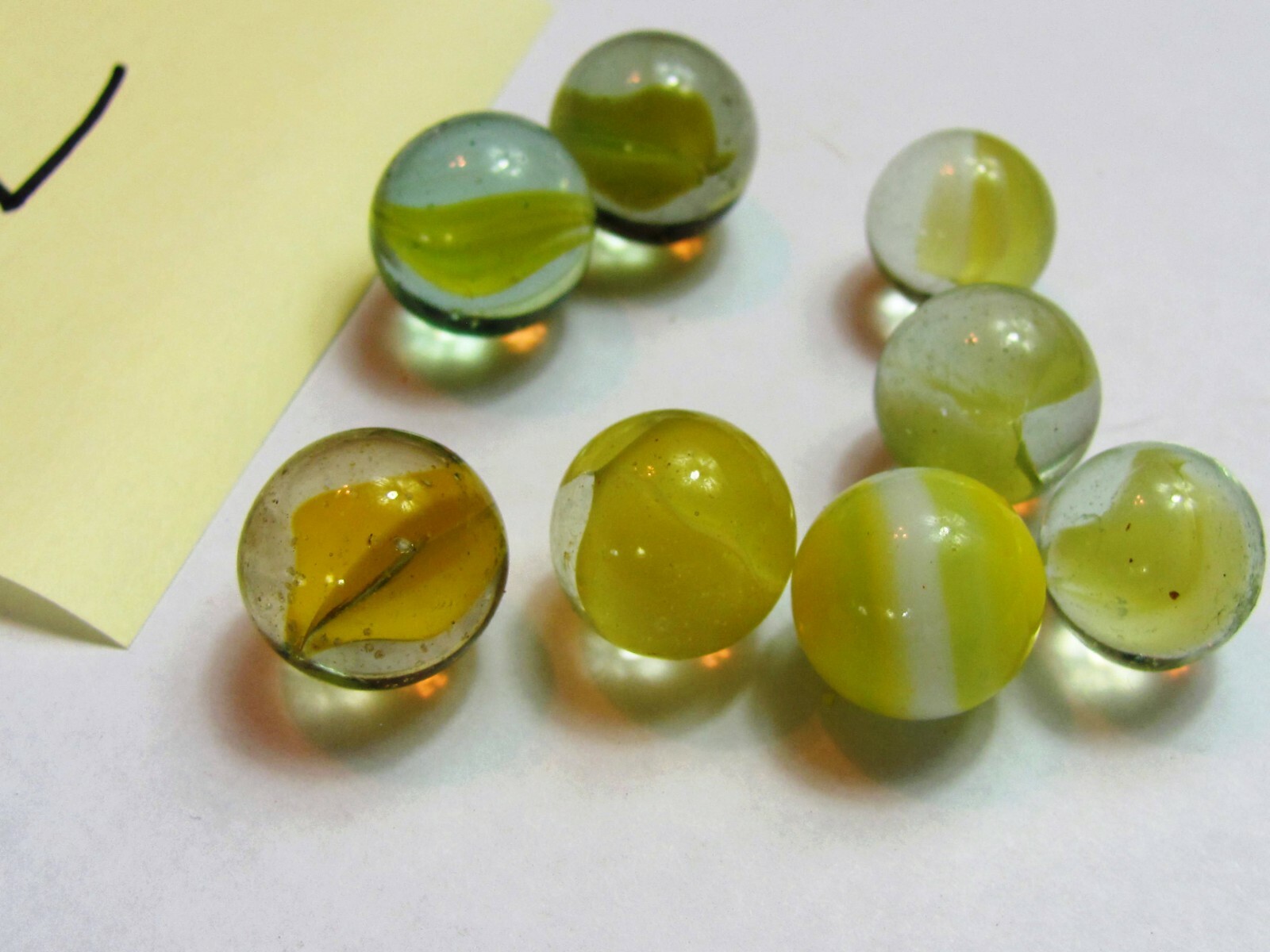 Lot of 8 Vintage Marbles 1/2″ – 5/8″ YellowClear Double 4 Swirl Glass B131