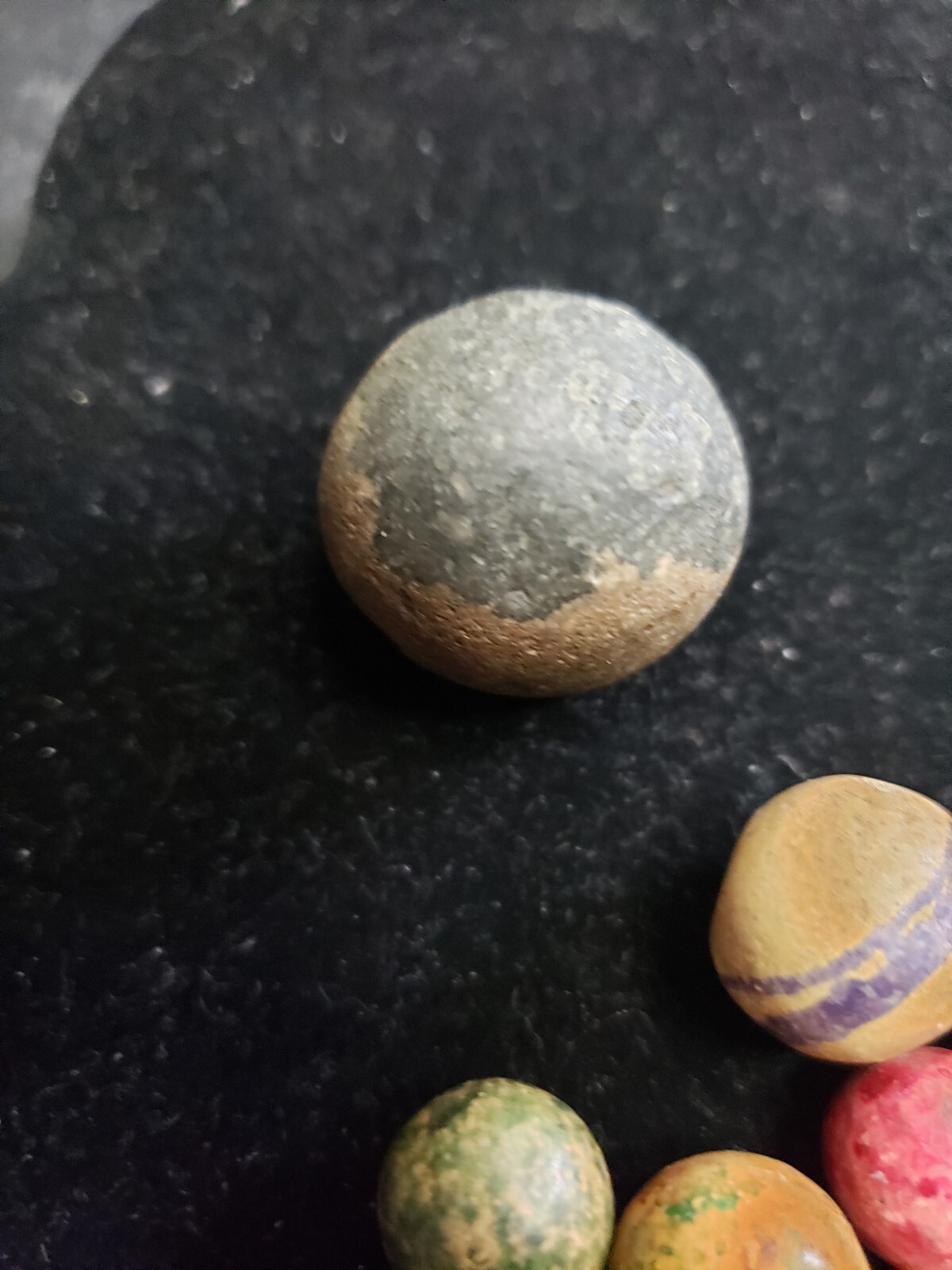 16 ANTIQUE CLAY MARBLES LARGEST 27MM