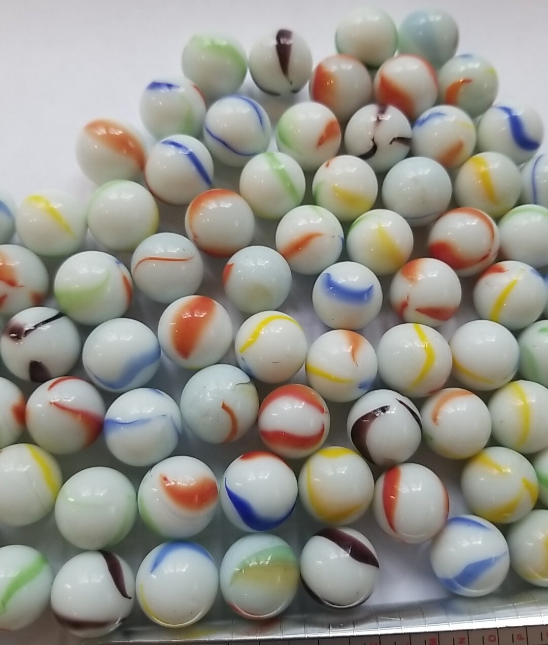 102 Standard Size Marbles Colors On White
