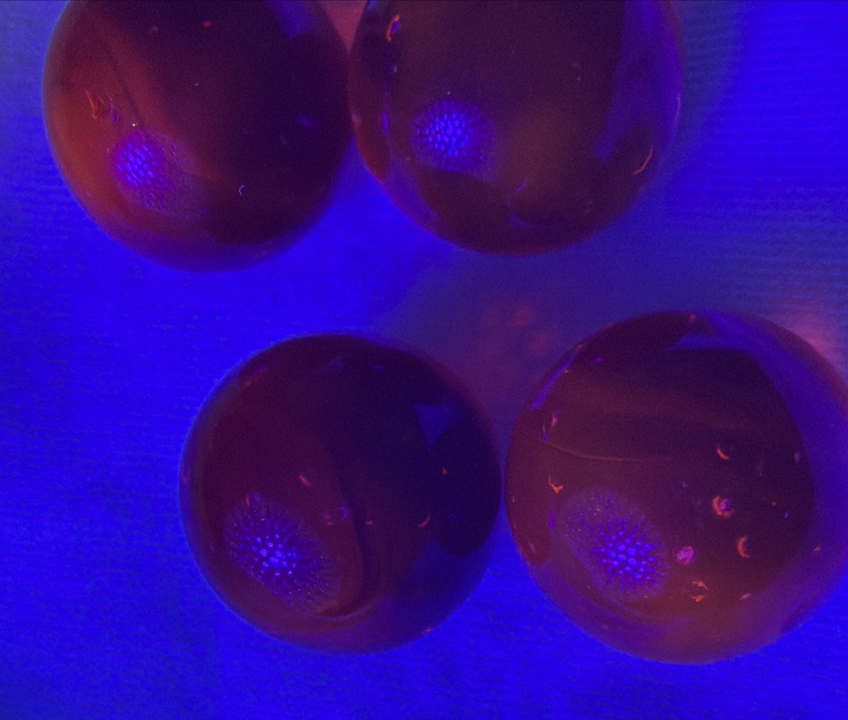Vintage Lot of 4 Clear Ruby Red Cadmium Slag Glass Marbles UV Reactive As Is