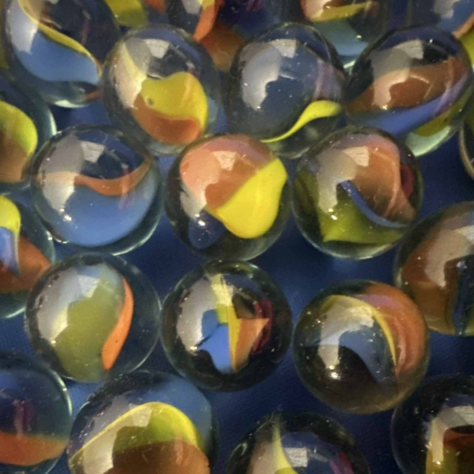 Cat’s Eye Glass Toy Marbles Lot Machine . unknown age