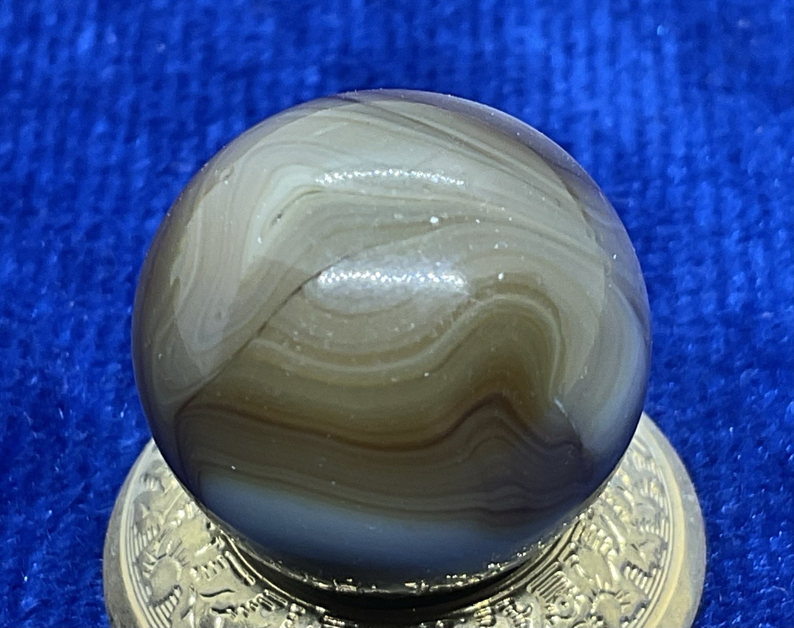 A Vintage Alley Agate “Pistachio” UV Marble. Measures .66” Mint Condition.