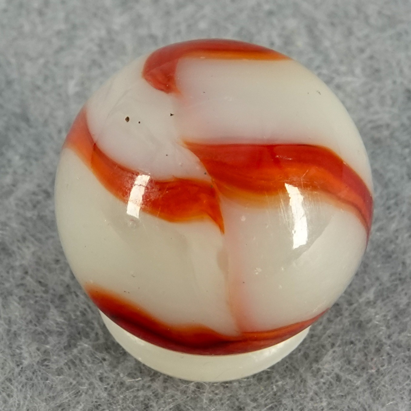 Marbles: PELTIER GLASS COMPANY, Red Zebra. 21/32″. Mint (-) (9.1). (B1005)