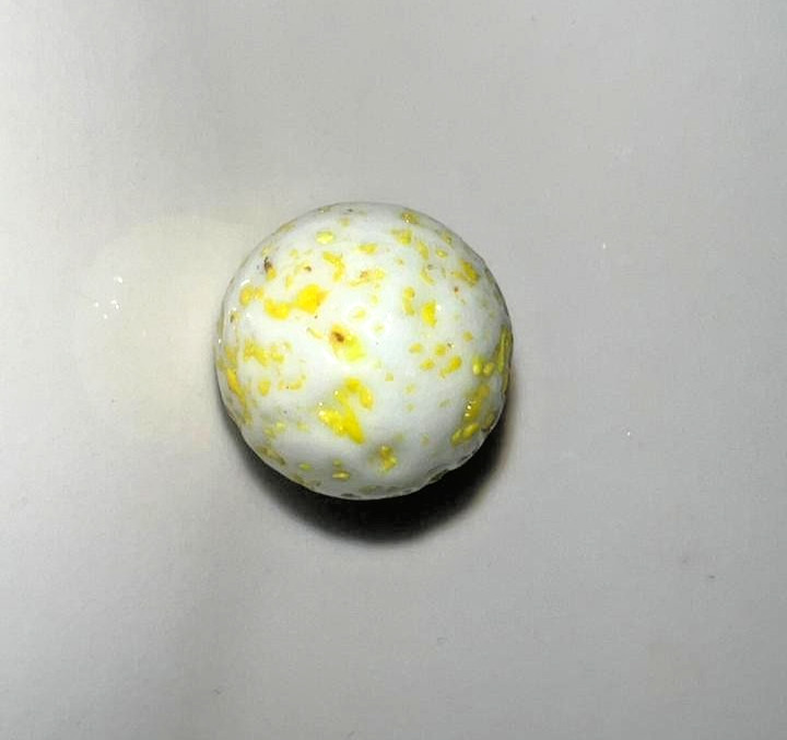 21 vintage handmade glass marbles with colorful swirls and unique patterns.