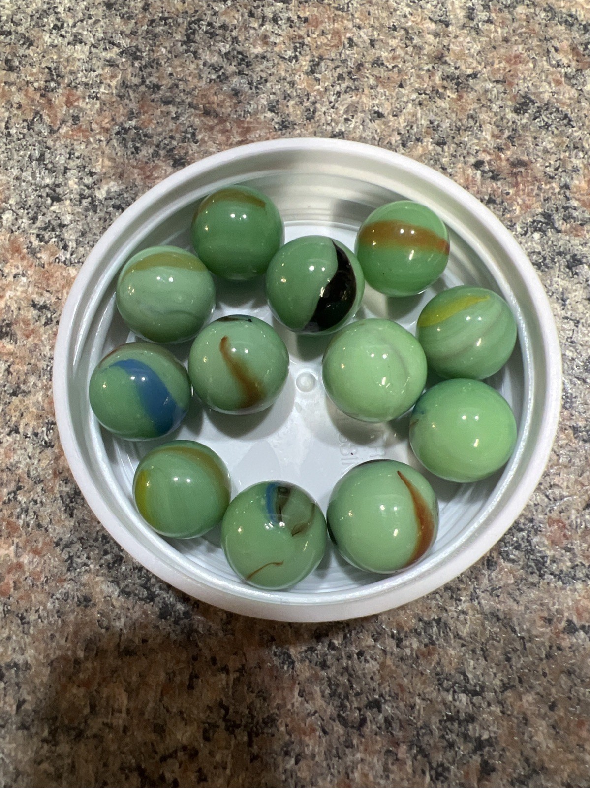 Lot of 12 Green Glass Marbles Colored Swirl