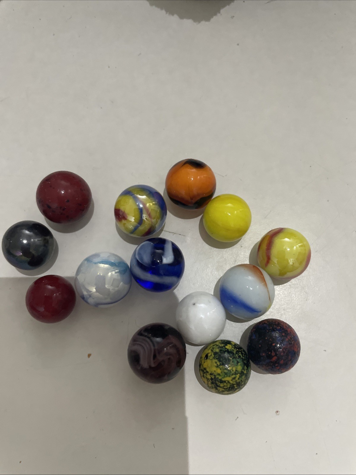 8 Small Marbles And 6 Tiny Marbles