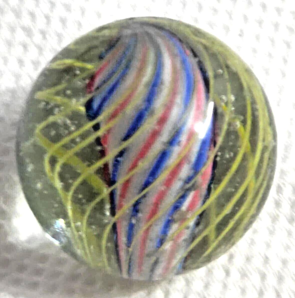 OLD 2 TOY MARBLES multi colored solid core caged 1 tri level ,2 blue base glass
