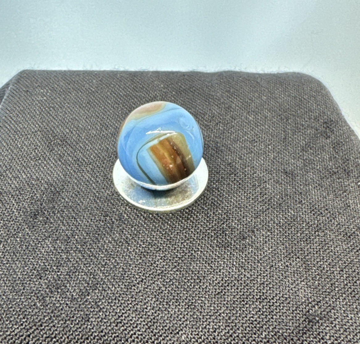 Christiansen Agate Opaque Blue Base With Brown Swirls..63″ Wet Htf Brown