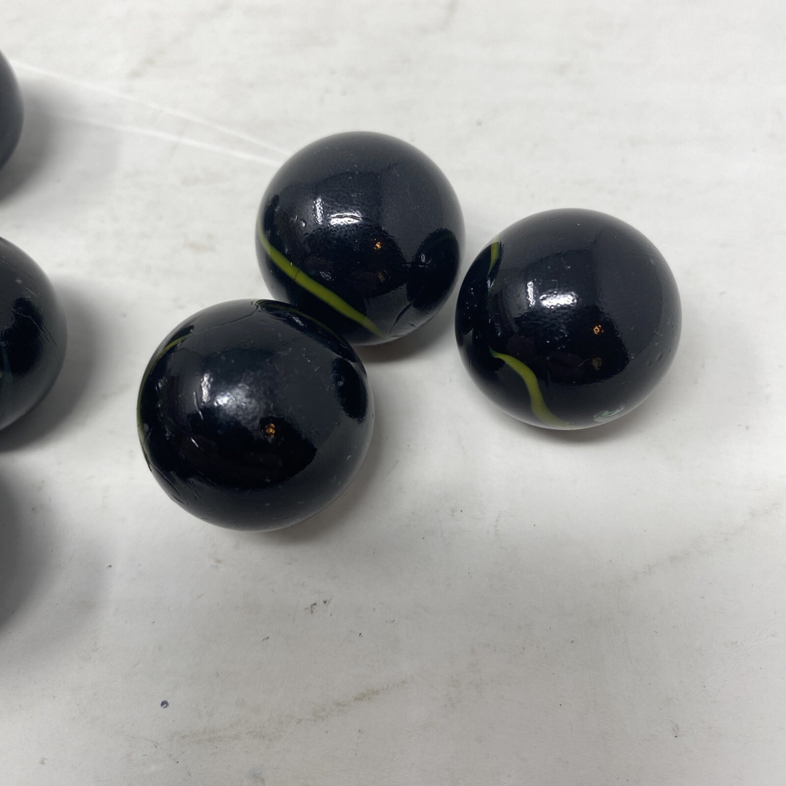 Lot Of 11 Vintage Marbles Black With Green/Yellow Color Swirl