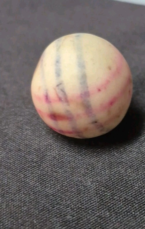 ANTIQUE HELIX LINED UNGLAZED PROCELIAN CLAY MARBLE