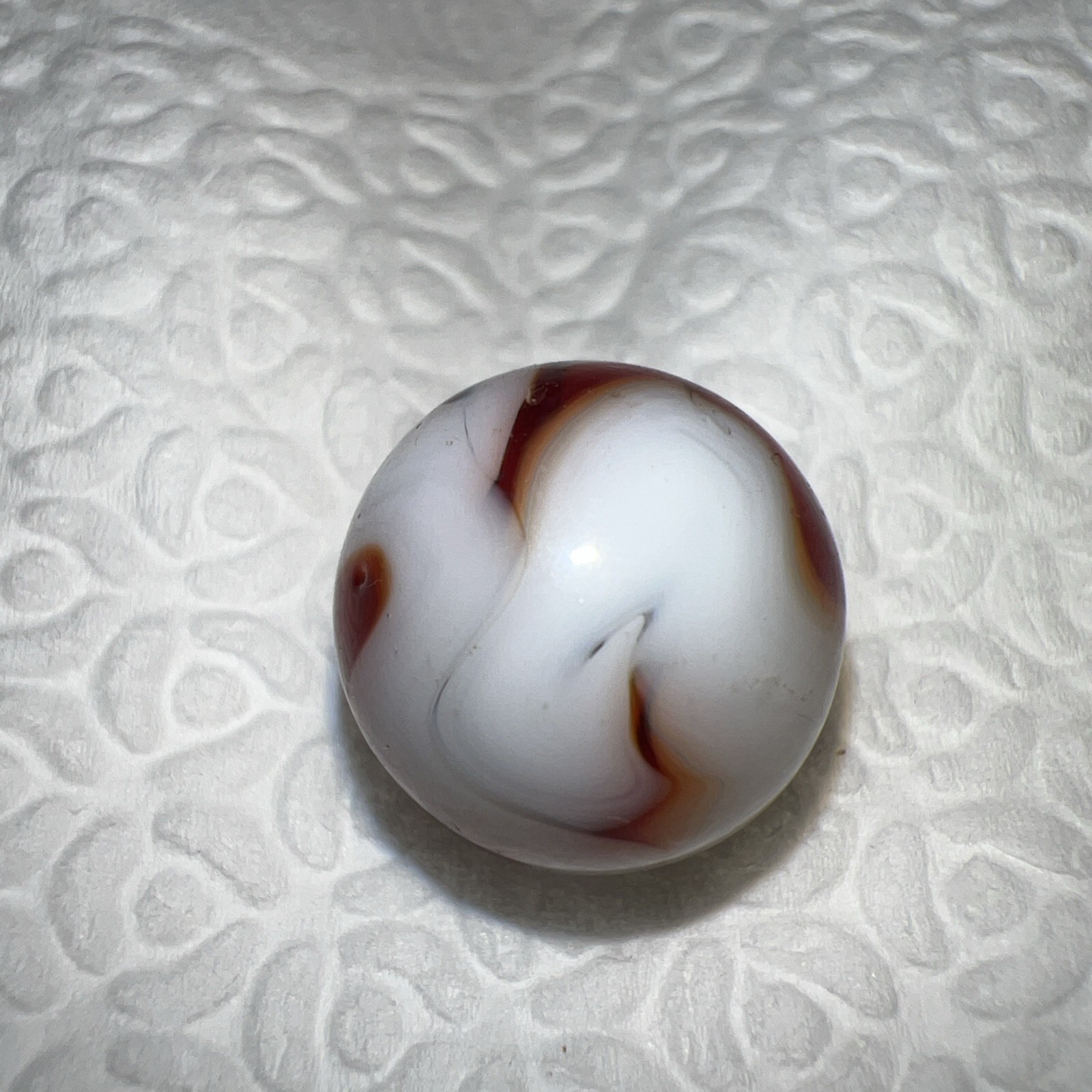 Stunning Alley Agate Oxblood Swirl Marble. .5